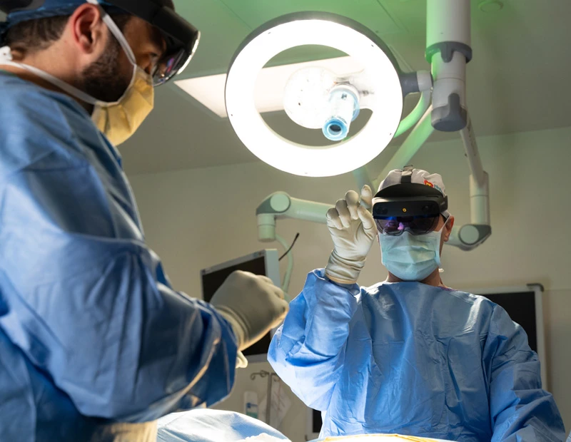 Dr. utset-ward in the operating room wearing mixed reality goggles.